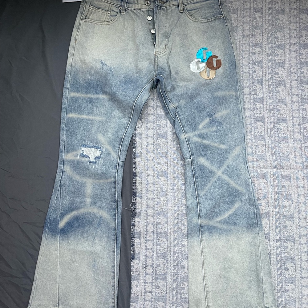 Gallery Dept Light Blue Washed Bootcut Jeans with Multicolor Patch